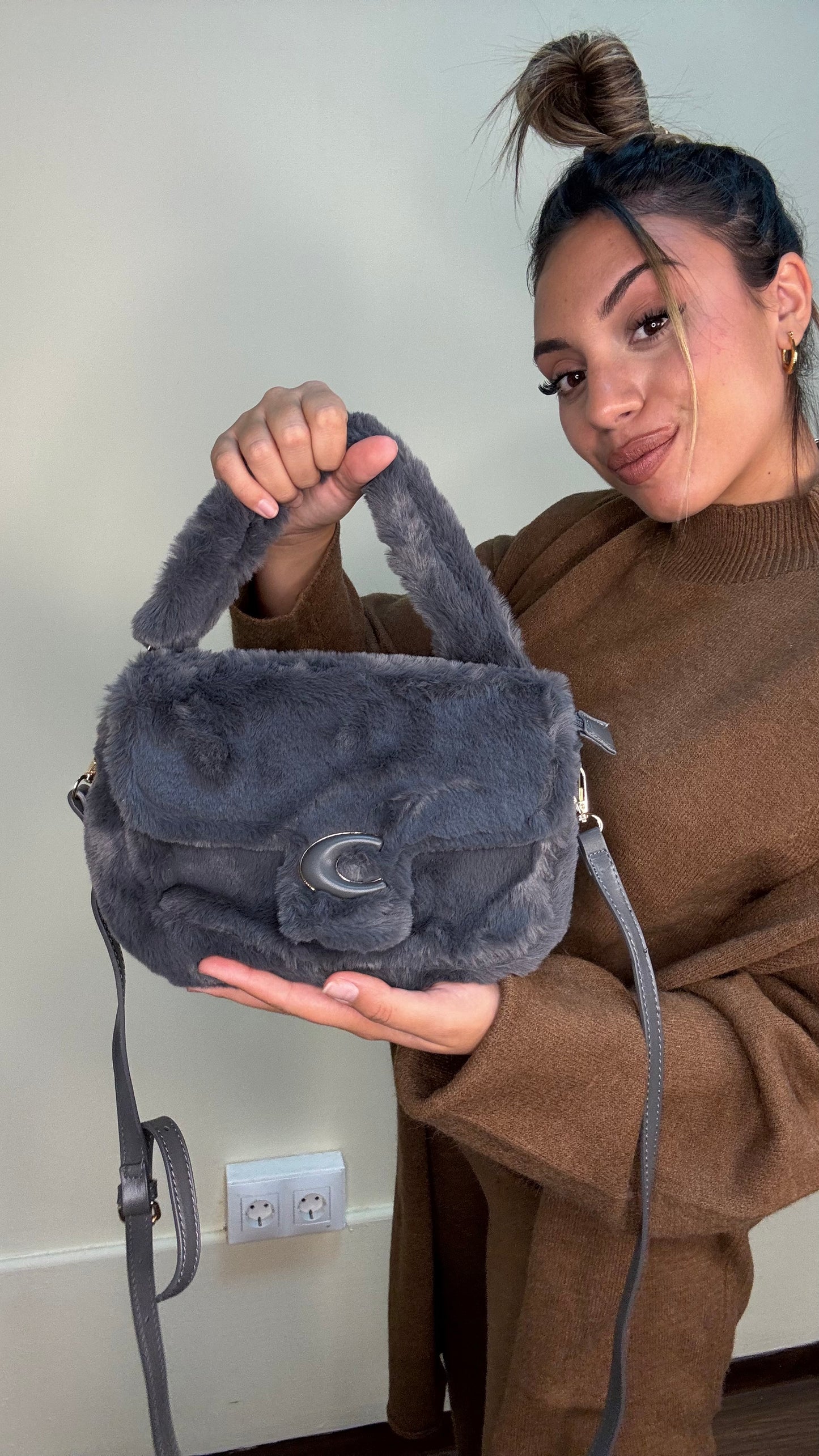 Bolso coach pelito