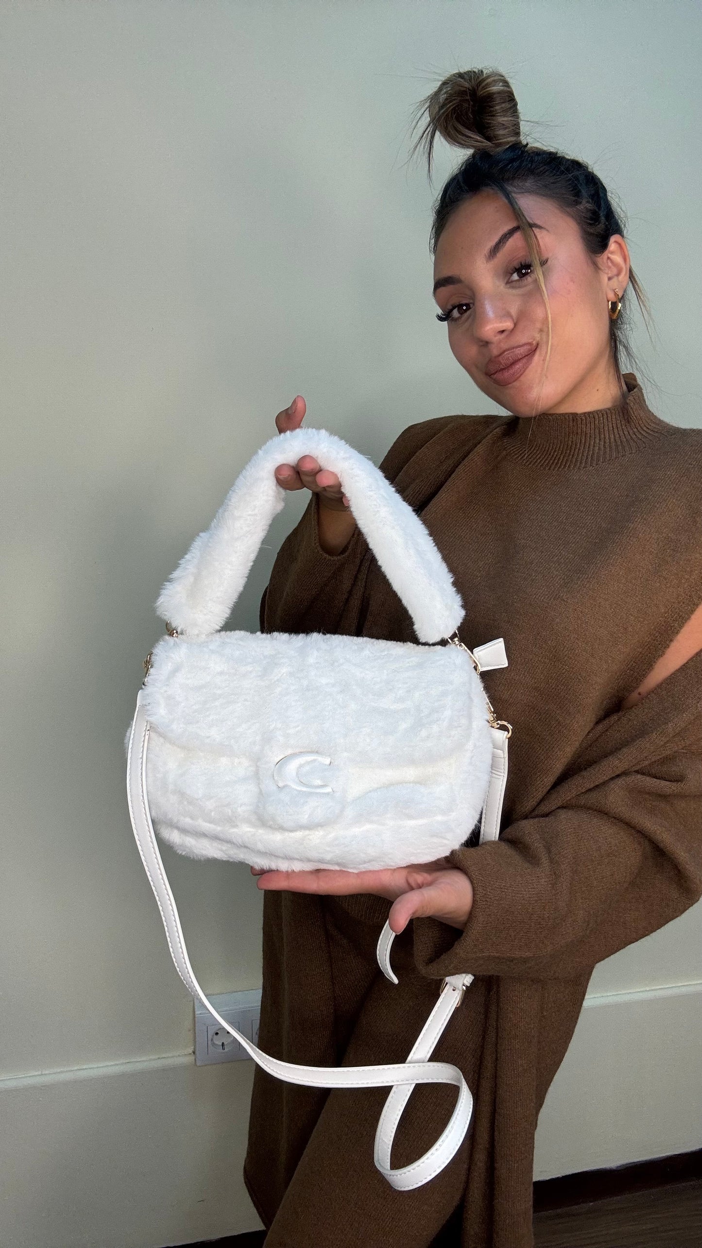 Bolso coach pelito